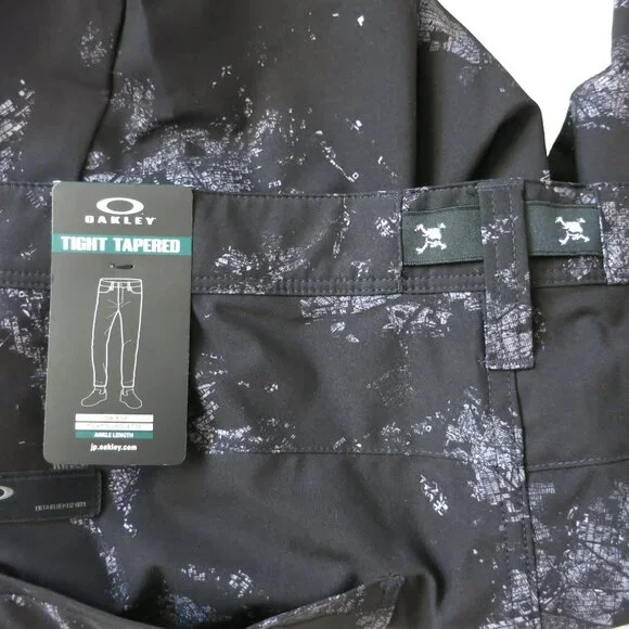 NWT OAKLEY SKULL GOLF Japan Black Splash Print 3D Slim TAPERED Stretch Pants 34